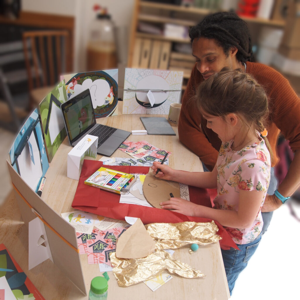 Releasing frustration through ripping fabric and cardboard leaves